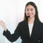 1621246392-1111asian_beautiful_smiling_woman_customer_support_phone_operator_window-scaled.jpg